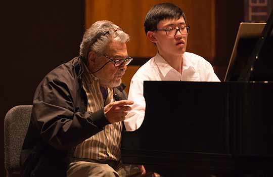 Leon Fleisher and student at piano